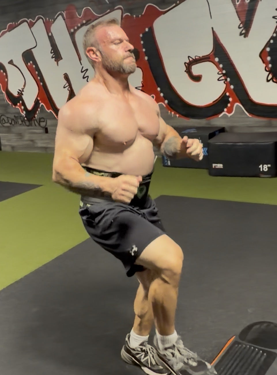 Adam performing physical conditioning in the gym