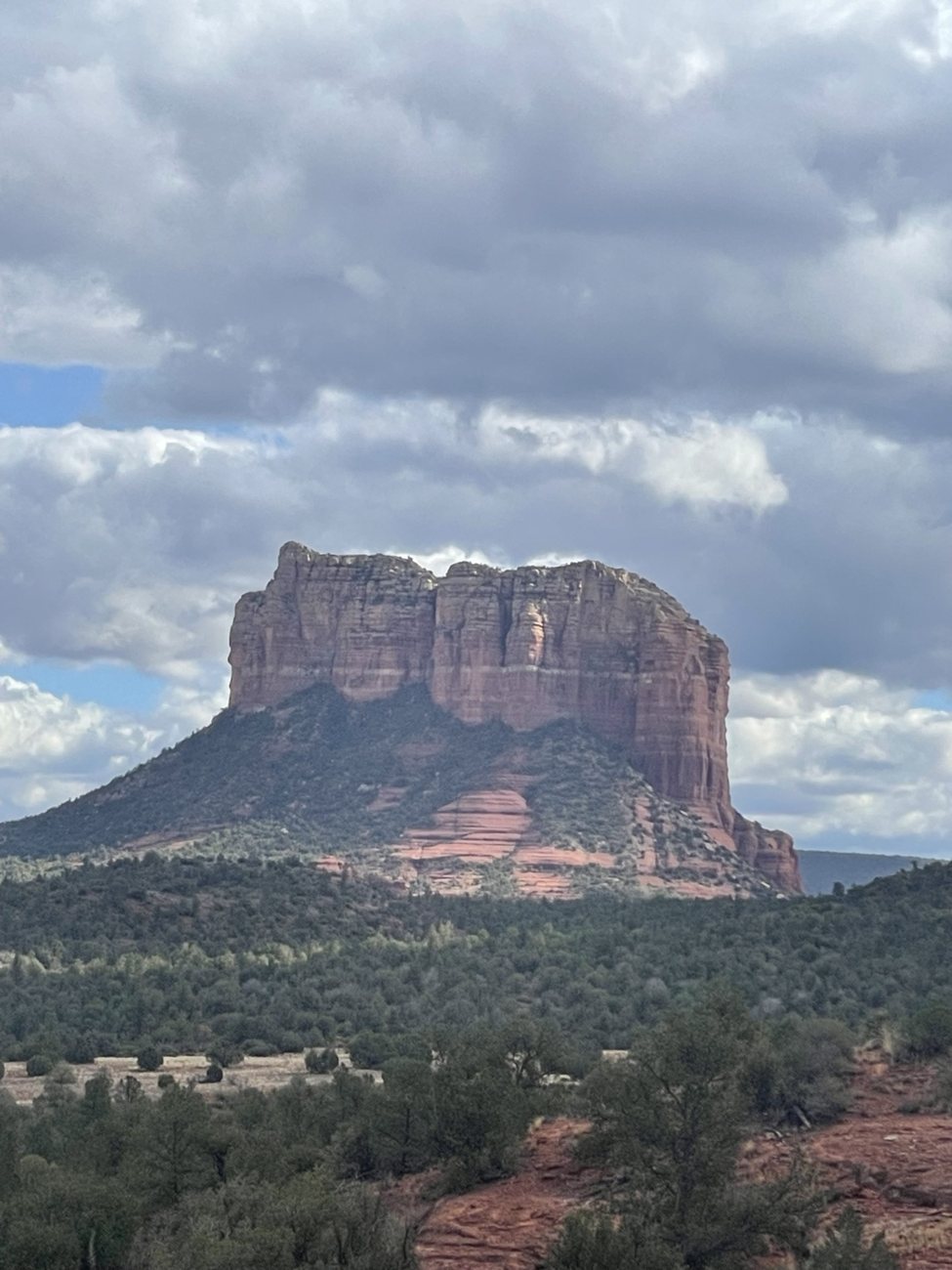 Mountain beneath a changing sky, photographed on Adam's journey